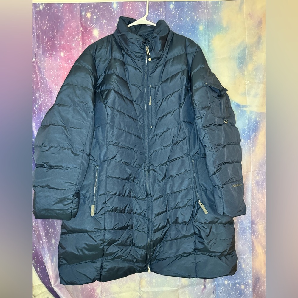 Woman’s Eddie Bauer coat insulated with 80% down and 20% waterfowl feathers